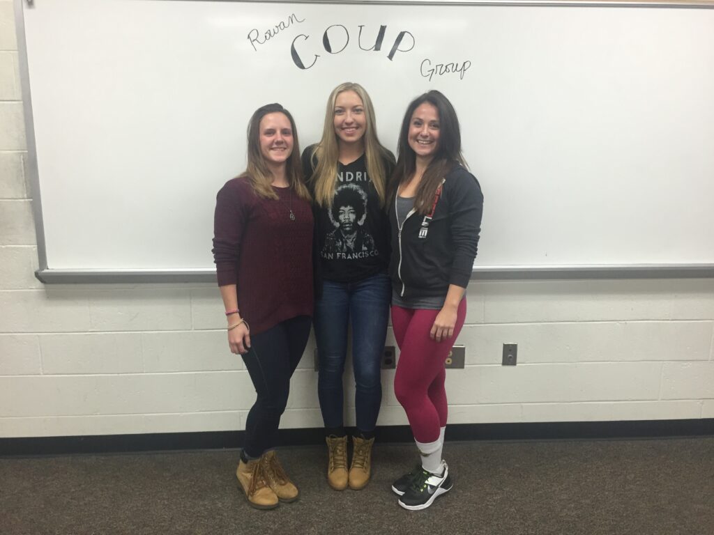 From left: COUP President Samantha Della Fave, junior accounting major Erica Fredericksdorf and junior health promotion and fitness management major Catherine Luick at the Tuesday, Dec. 8 COUP meeting. -Leon Purvis for The Whit