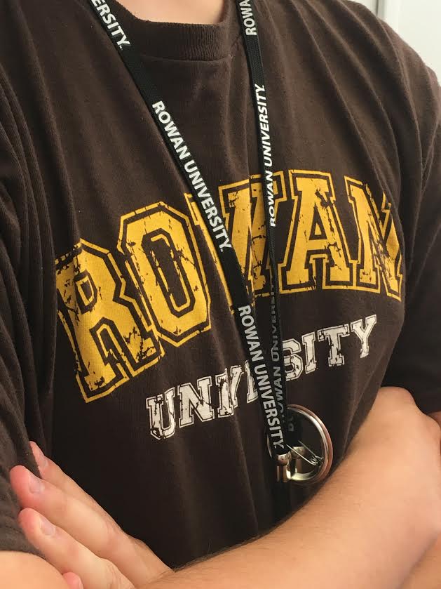 A student dons Rowan gear, including a Rowan lanyard. Photo courtesy of Nicole Mingo